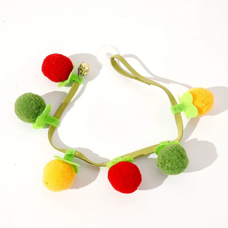 Interactive tomato-shaped cat toy with rope and bell