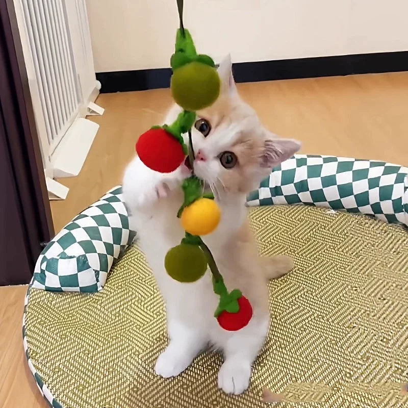 Brinquedo interativo para gatos em forma de tomate com corda e sininho