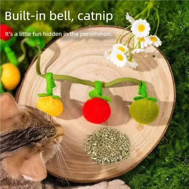 Brinquedo interativo para gatos em forma de tomate com corda e sininho
